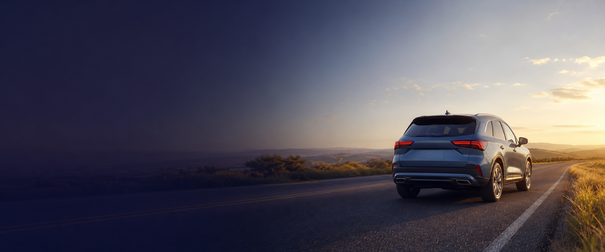 A vehicle traveling on an open road at golden hour.